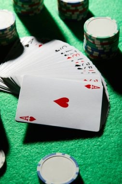 spy777 login mobile app showing poker table game on smartphone screen